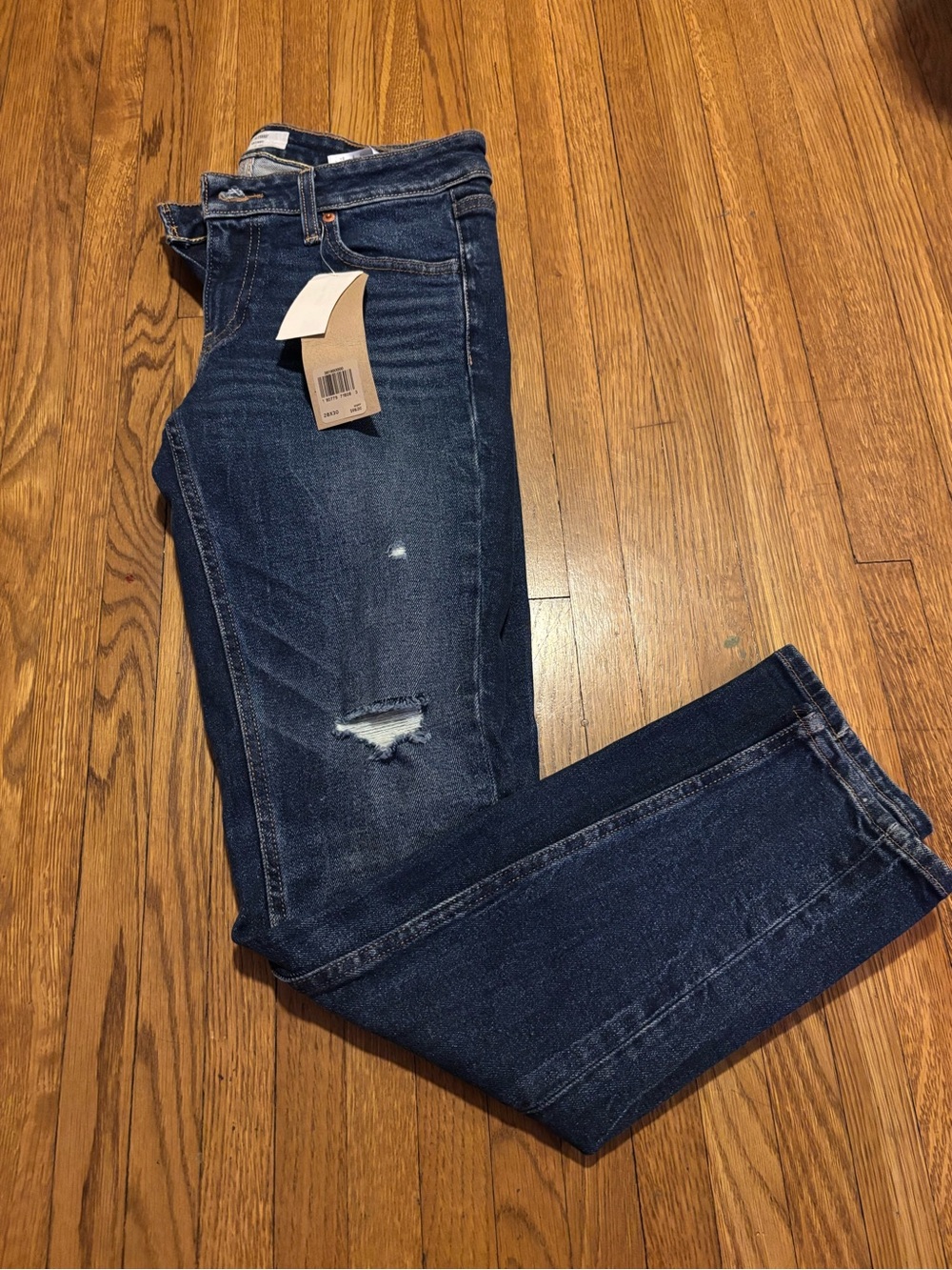 Levi's Women's Dark Indigo Skinny Jeans with Distressed Knee